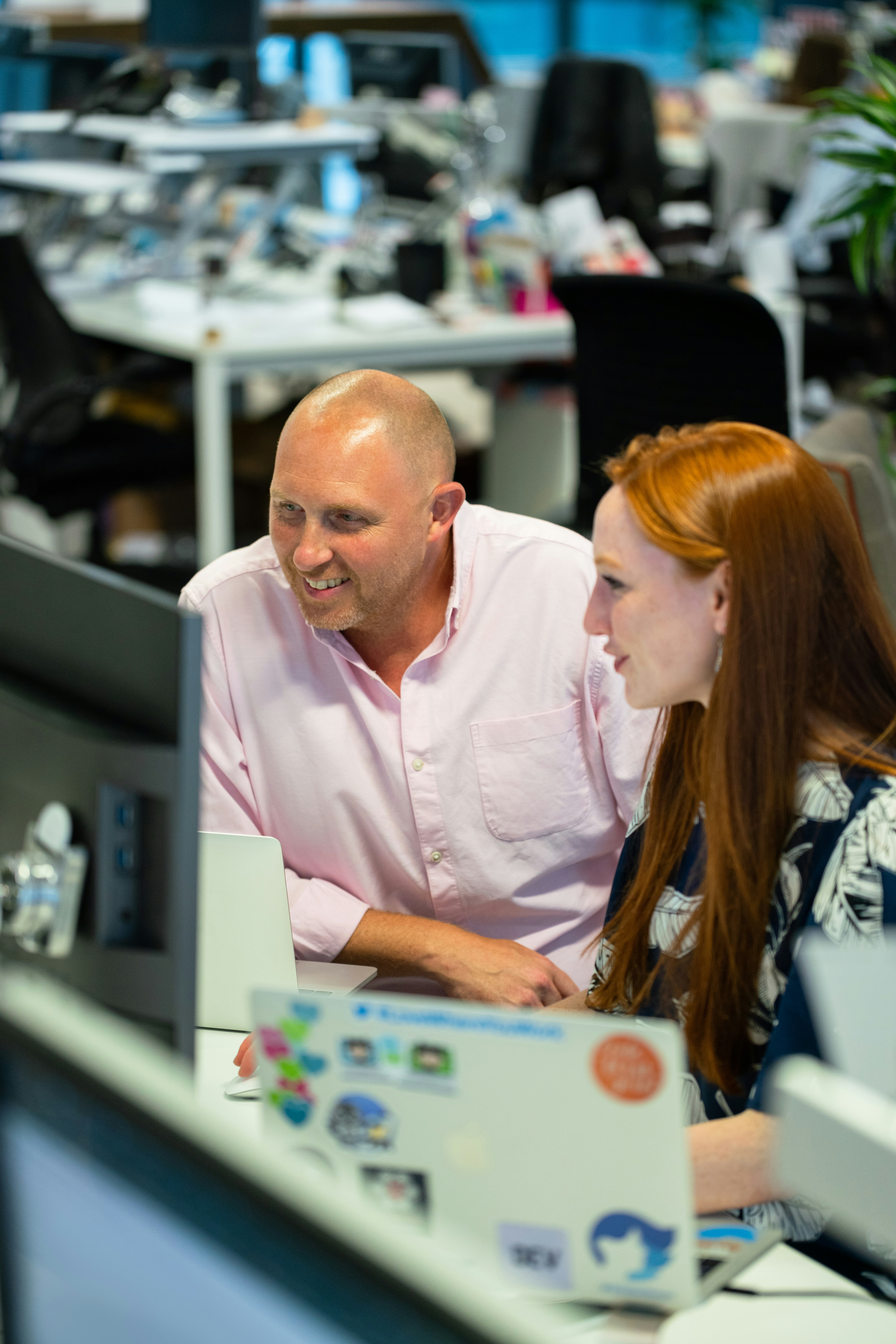 Colleagues working together in office